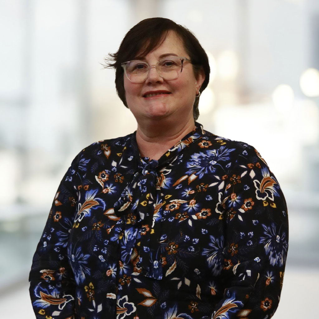 Debbie Vernon with office background