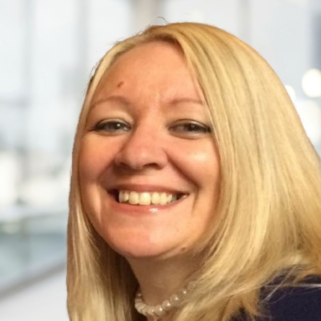 Kathryn Cooper with office background