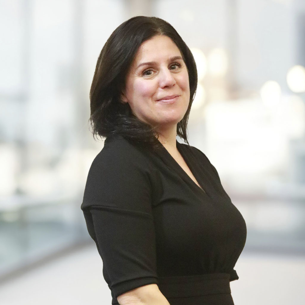 Lizzie Purewal with office background